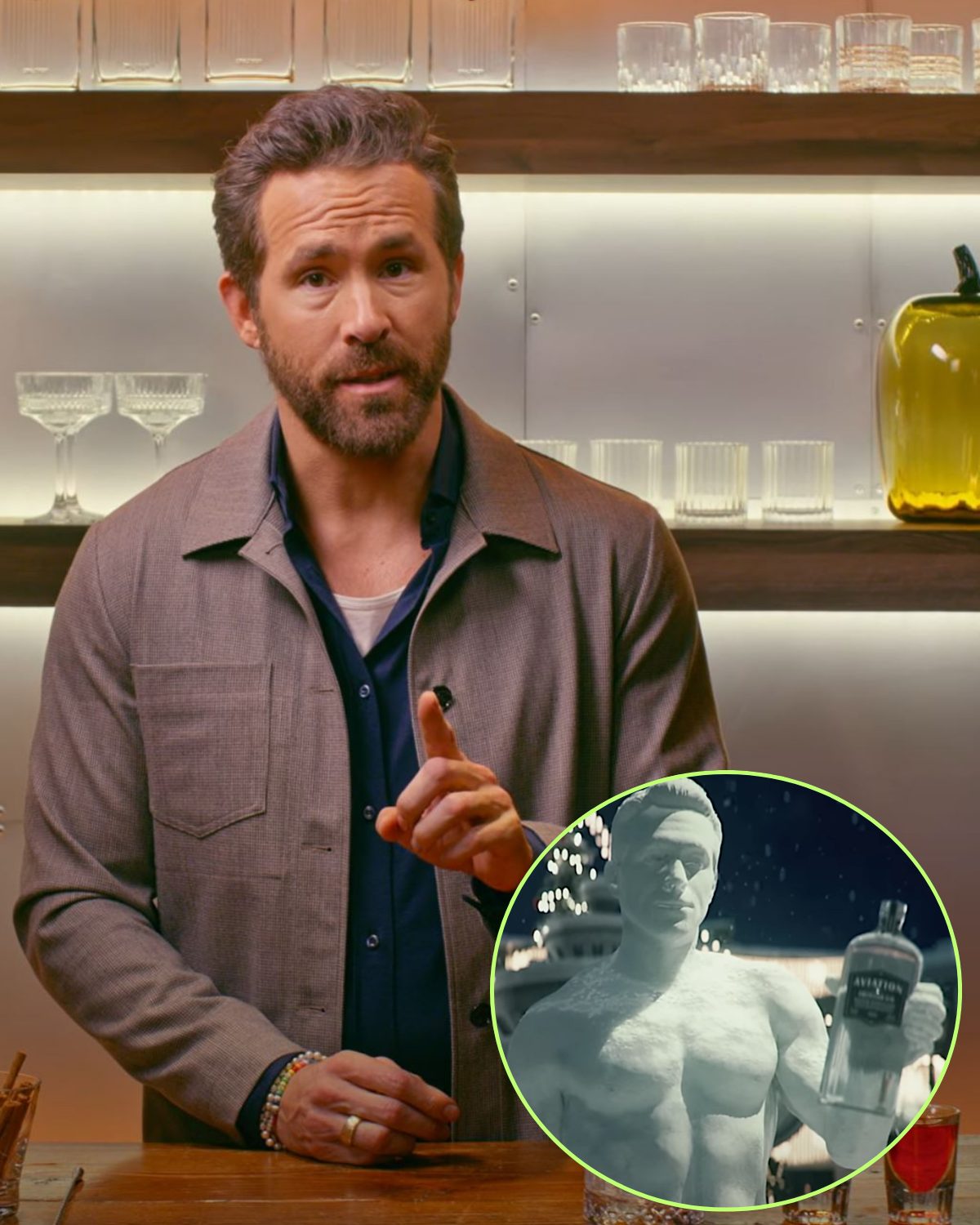 Cover Image for Ryan Reynolds humorously parodies Hot Frosty by portraying a na ked snowman in a new Aviation Gin commercial